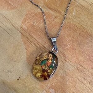 Mother Theresa in Resin Mold with Dried Flowers Detail